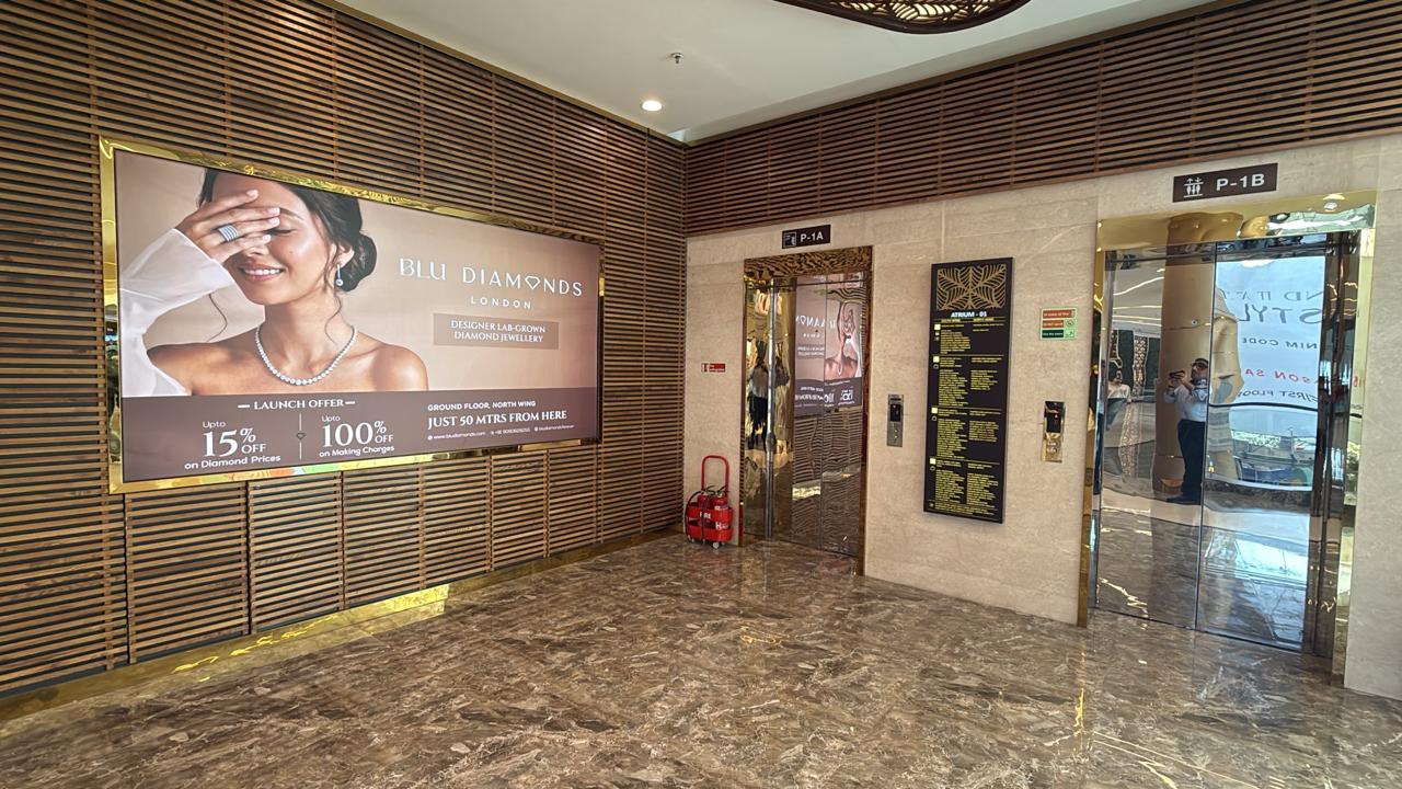 Elevator-bay branded panel
